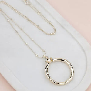 Gold Ring with Ball Necklace